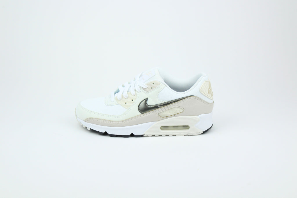 Nike Air Max 90 (Women's) sneakers in 'White & Flat Pewter' colorway, stylish and comfortable women's athletic shoes with white and pewter accents, perfect for casual and sporty wear.