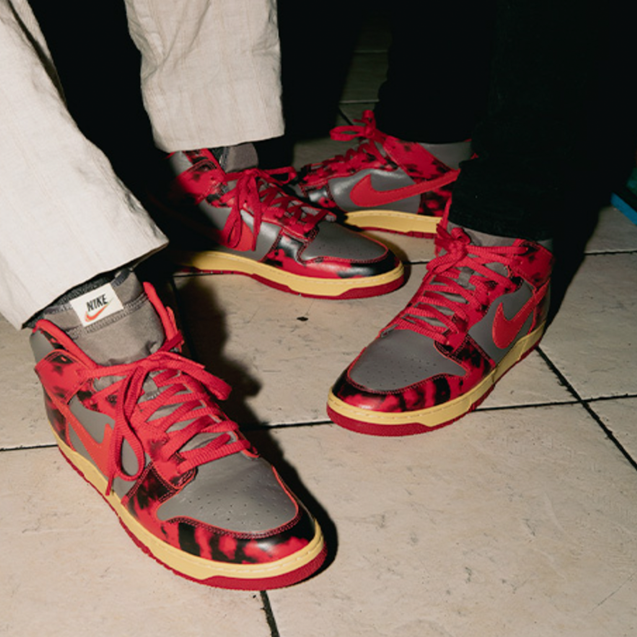 Nike Dunk High 85 SP Acid Wash sneaker in red with vintage treated leather upper and classic high top Dunk silhouette