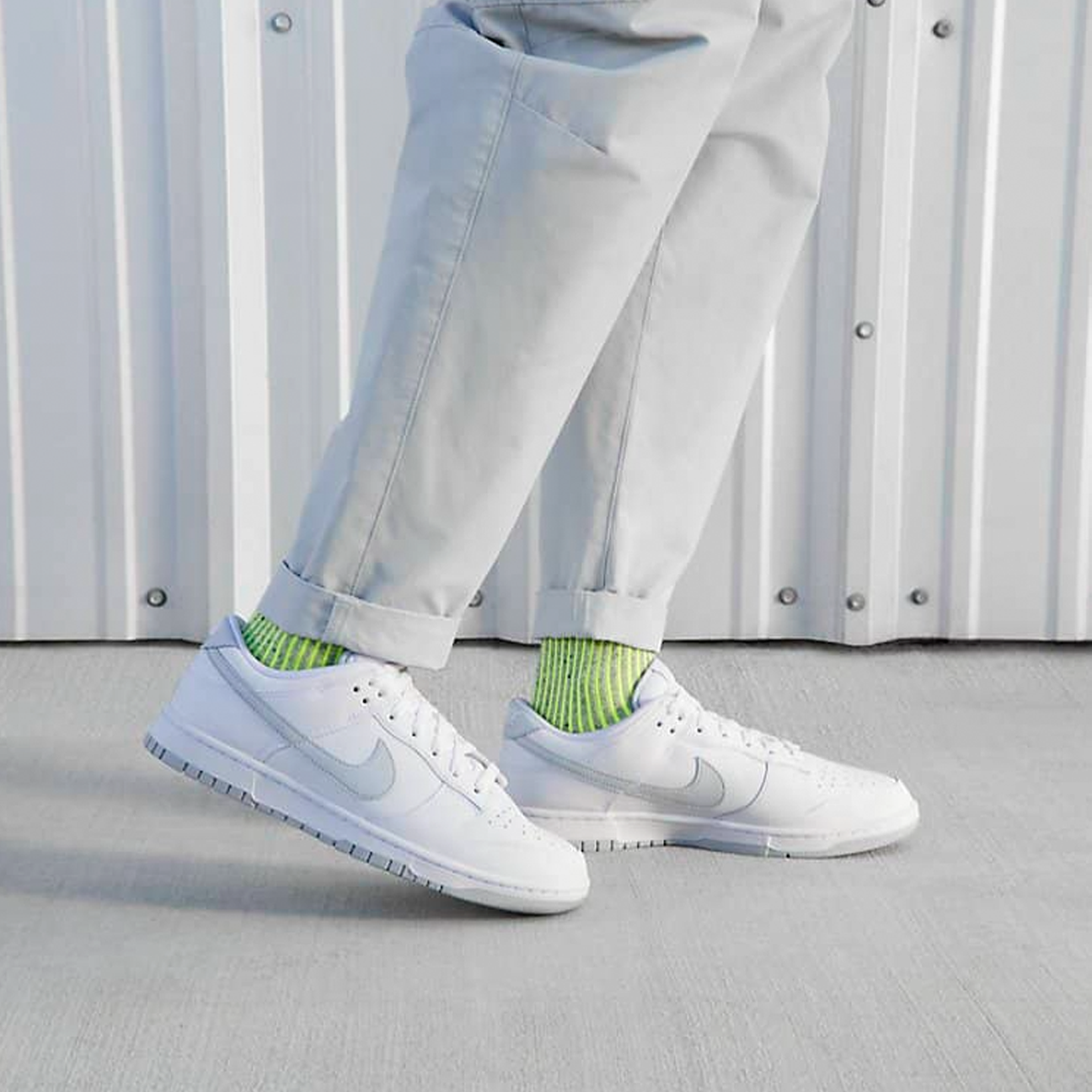 Nike Dunk Low Pure Platinum with white and light grey leather upper, low-top silhouette and white rubber sole, side view product image