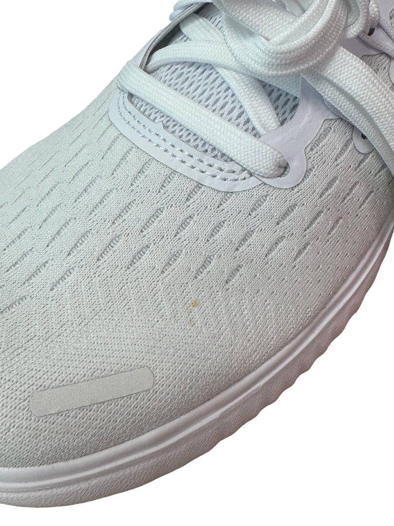 Nike Free RN 2018 White running shoe with lightweight white mesh upper flexible sole and minimalist design available at The Attic