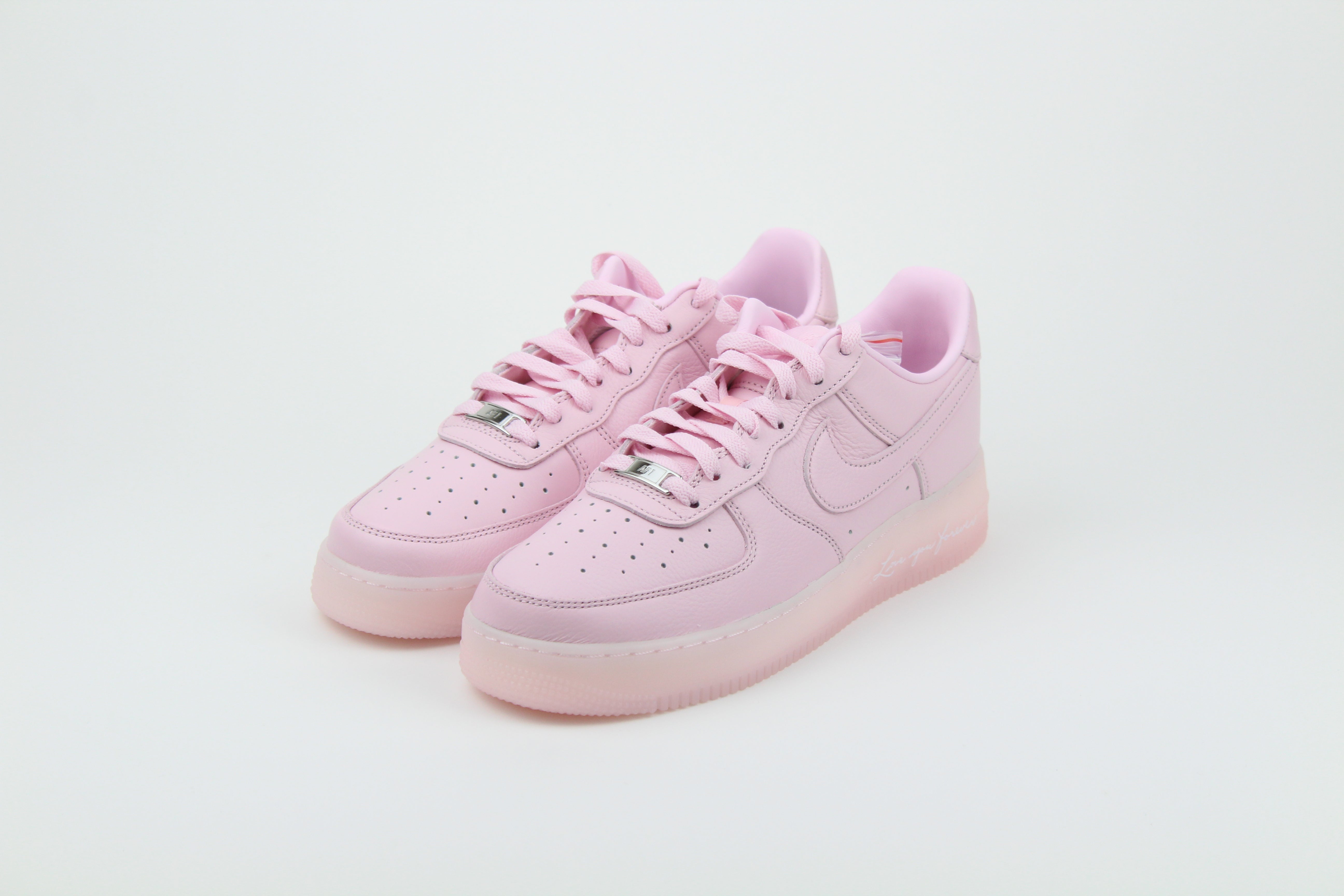 NOCTA x Nike Air Force 1 Low 'Pink Foam' from Certified Lover Boy Pack in soft pink leather. Classic cushioning meets fresh, streetwear style.