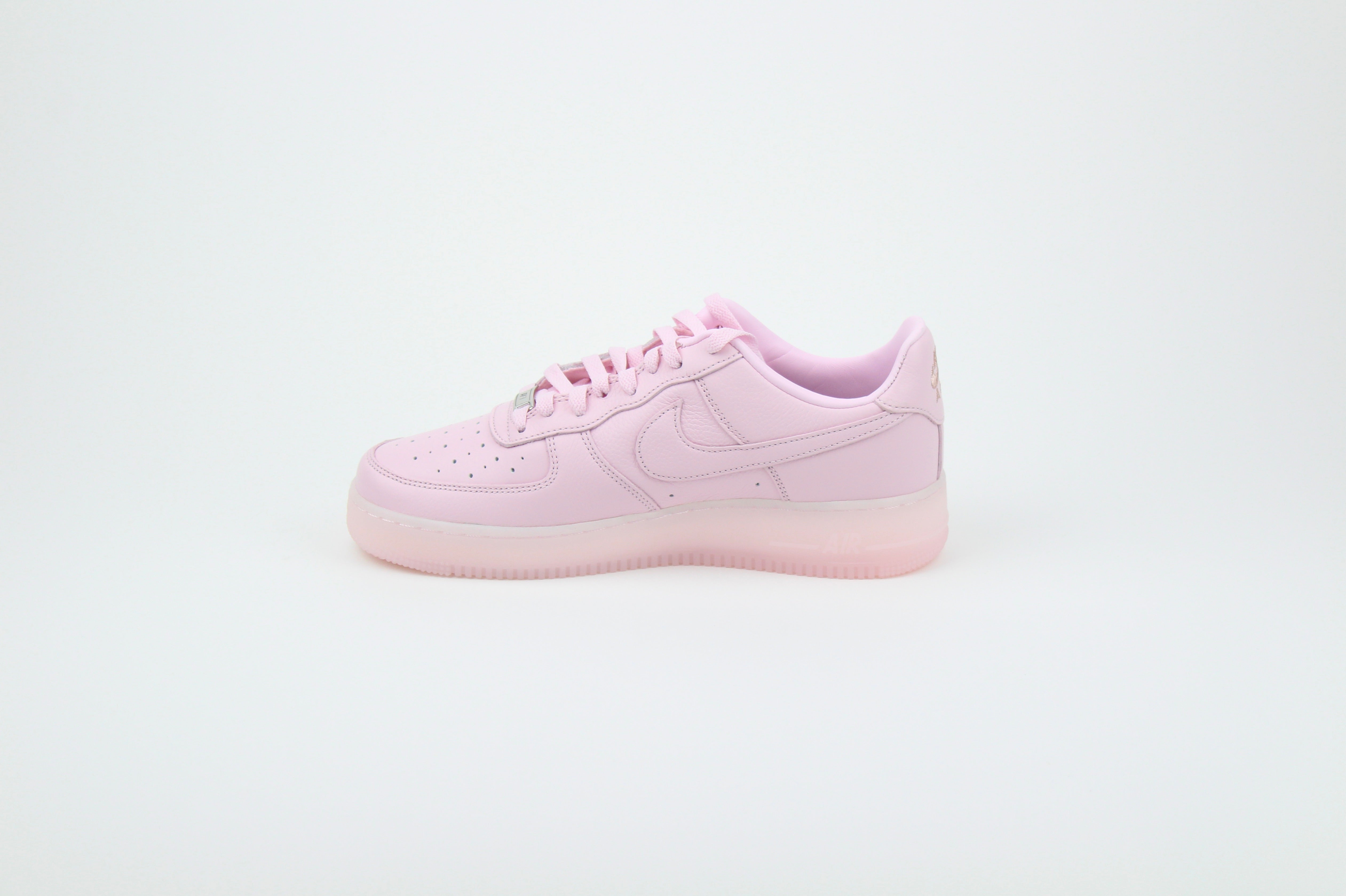 NOCTA x Nike Air Force 1 Low 'Pink Foam' from Certified Lover Boy Pack in soft pink leather. Classic cushioning meets fresh, streetwear style.