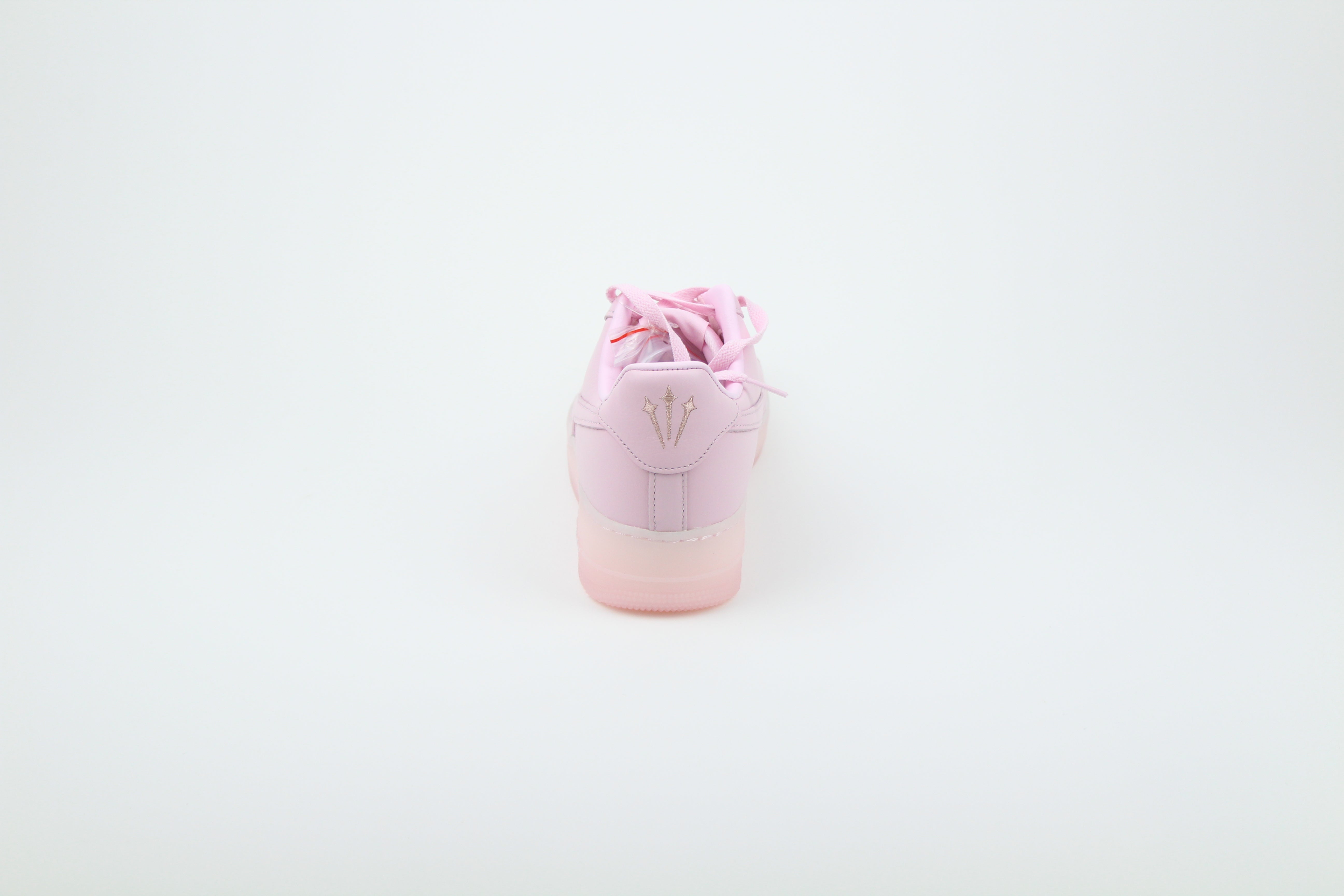 NOCTA x Nike Air Force 1 Low 'Pink Foam' from Certified Lover Boy Pack in soft pink leather. Classic cushioning meets fresh, streetwear style.