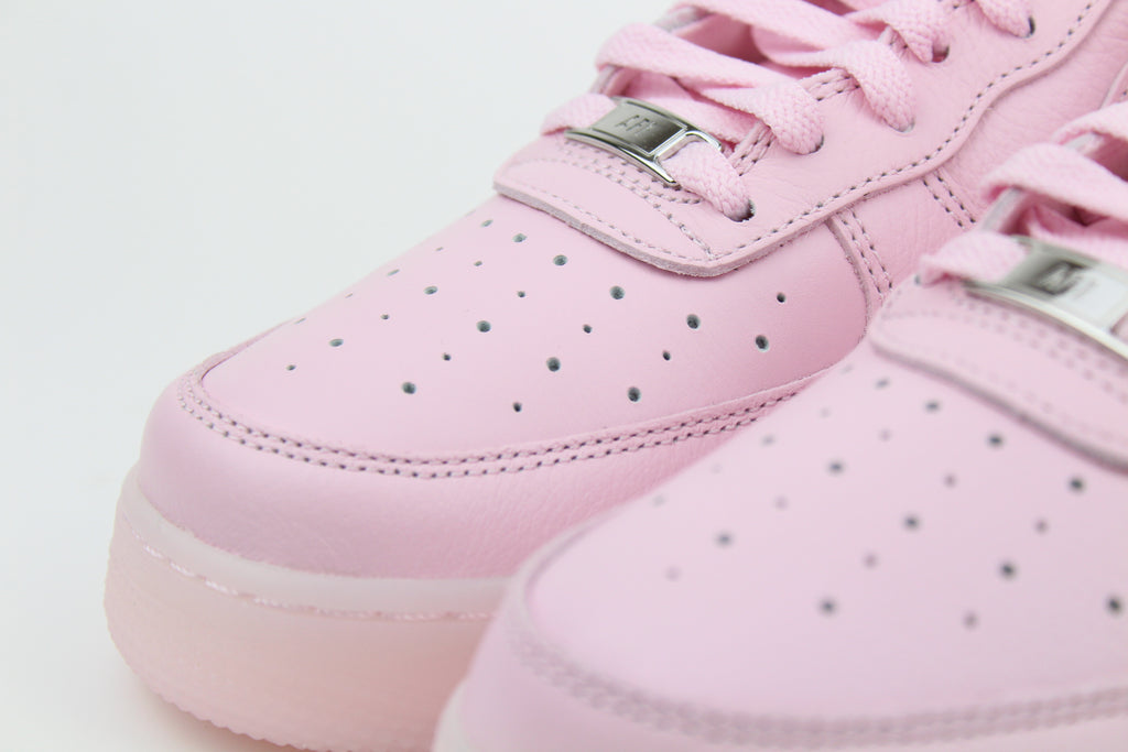 NOCTA x Nike Air Force 1 Low 'Pink Foam' from Certified Lover Boy Pack in soft pink leather. Classic cushioning meets fresh, streetwear style.