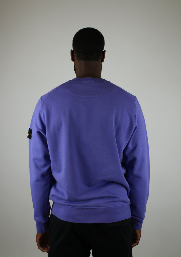 Shop the Stone Island Felpa Crewneck 'Purple' – a premium cotton crewneck with the iconic compass patch, combining comfort, quality, and standout streetwear style.