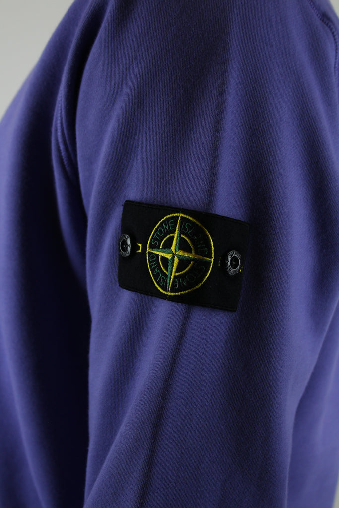 Shop the Stone Island Felpa Crewneck 'Purple' – a premium cotton crewneck with the iconic compass patch, combining comfort, quality, and standout streetwear style.