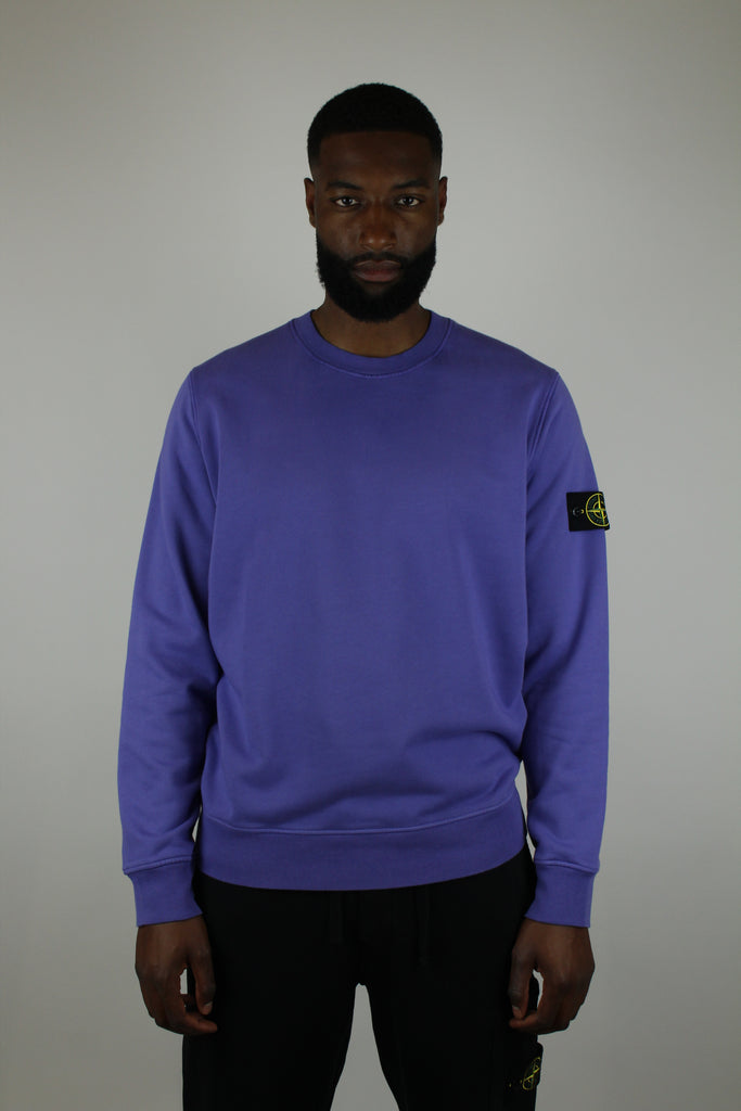 Shop the Stone Island Felpa Crewneck 'Purple' – a premium cotton crewneck with the iconic compass patch, combining comfort, quality, and standout streetwear style.