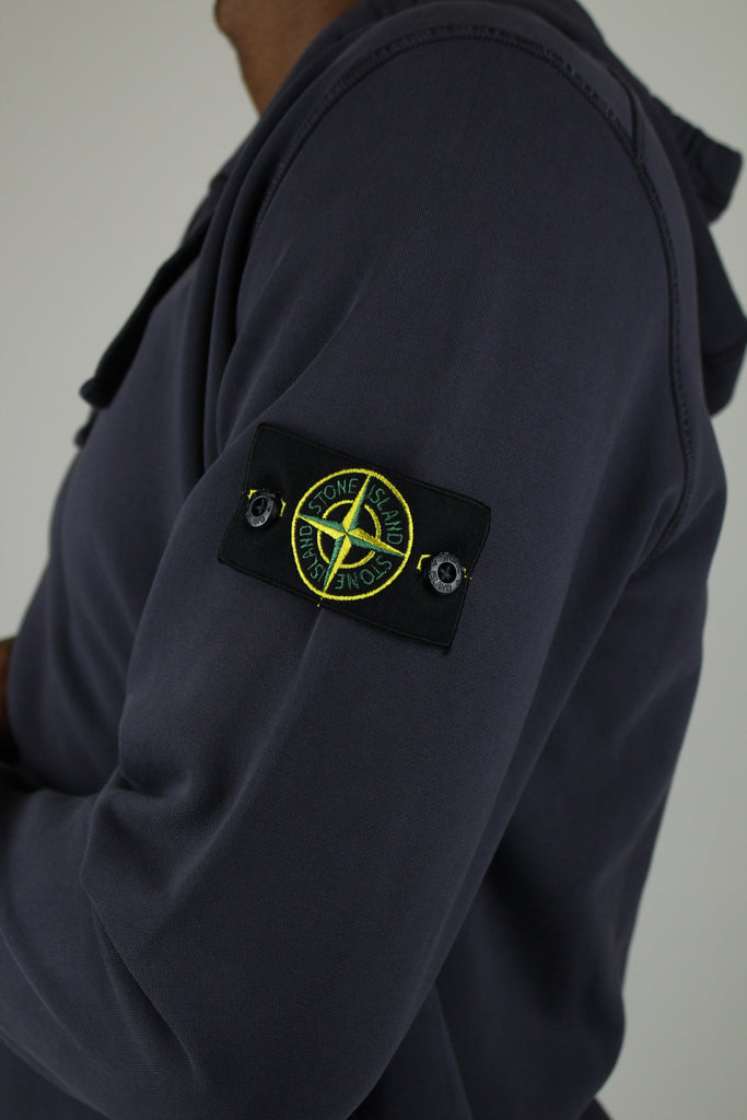 Shop the Stone Island Felpa Hoodie 'Ink Blue' – a premium cotton hoodie with a relaxed fit, iconic compass patch, and versatile deep blue finish for refined streetwear style.
