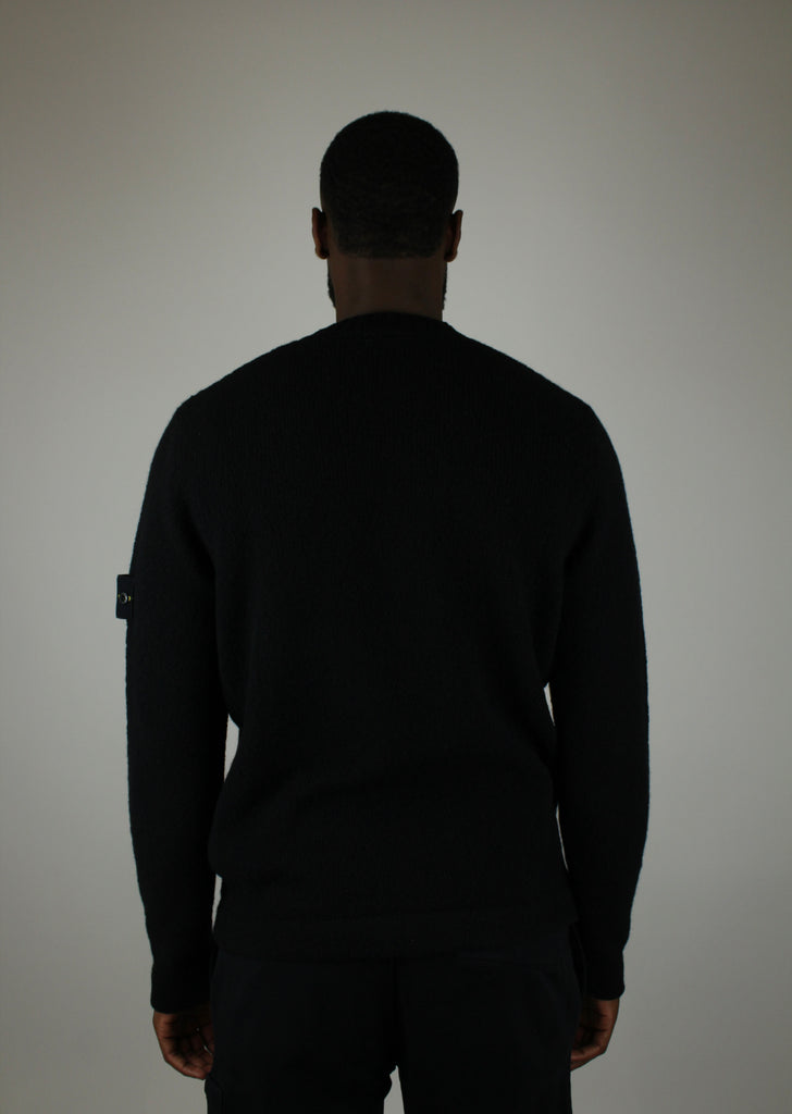 Stone Island Knit Crewneck 'Black' – classic, high-quality knit sweater with a sleek black finish, soft fabric, and iconic logo, perfect for versatile casual and streetwear looks.