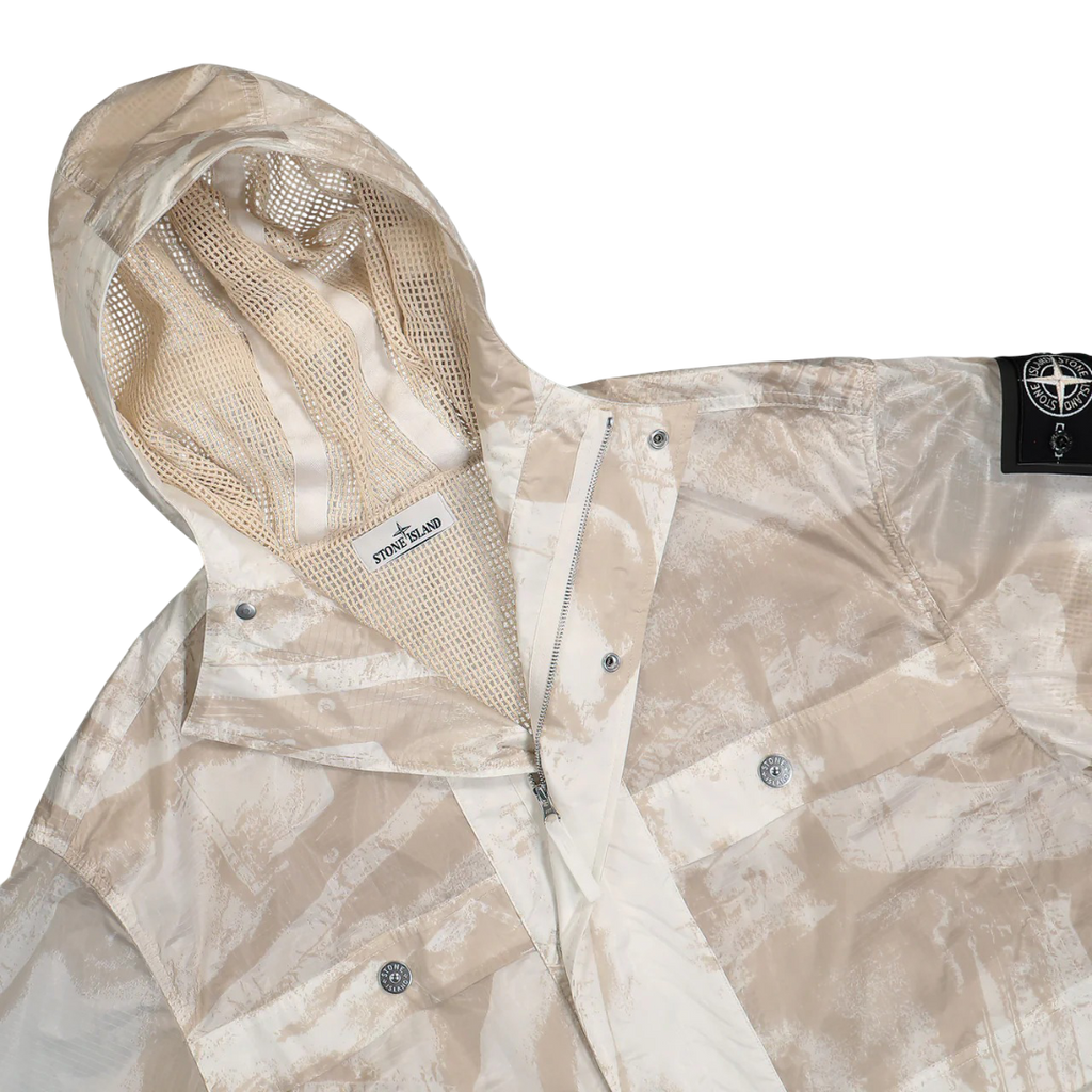 Stone Island UV-reactive Nylon Parka 'Camouflage Desert' – lightweight waterproof jacket with UV-sensitive camouflage pattern, functional design, and iconic logo, perfect for urban and outdoor style.