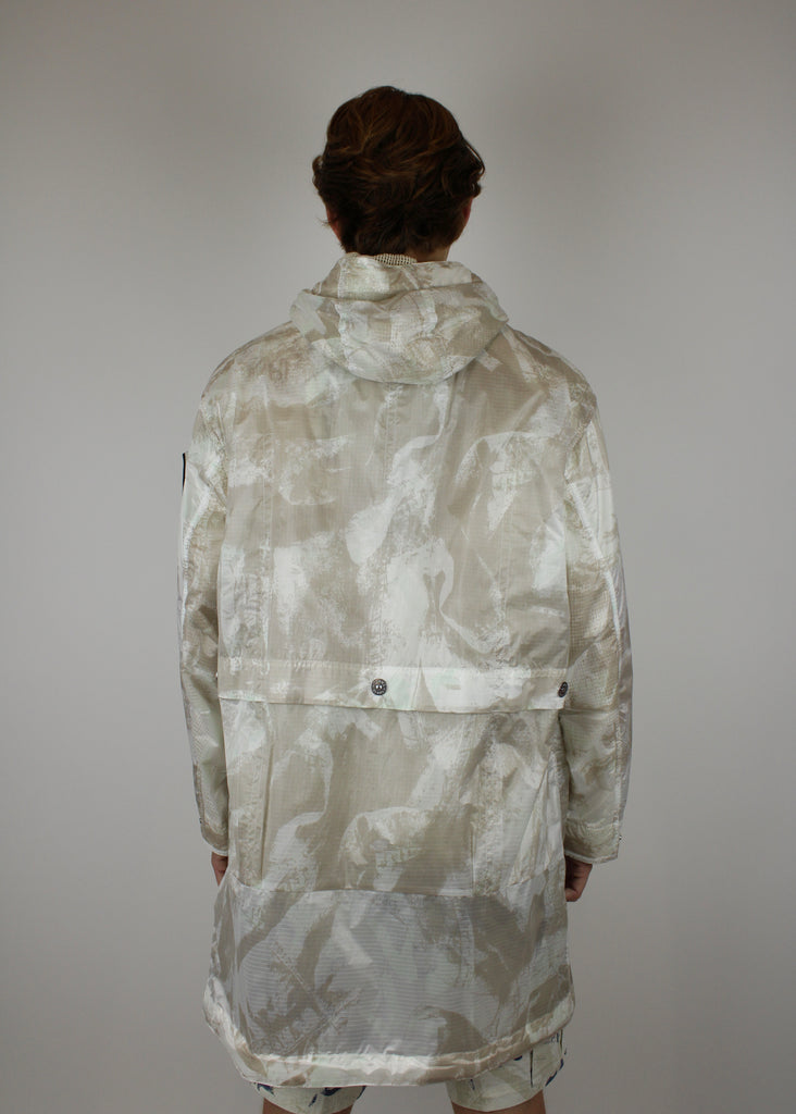 Stone Island UV-reactive Nylon Parka 'Camouflage Desert' – lightweight waterproof jacket with UV-sensitive camouflage pattern, functional design, and iconic logo, perfect for urban and outdoor style.