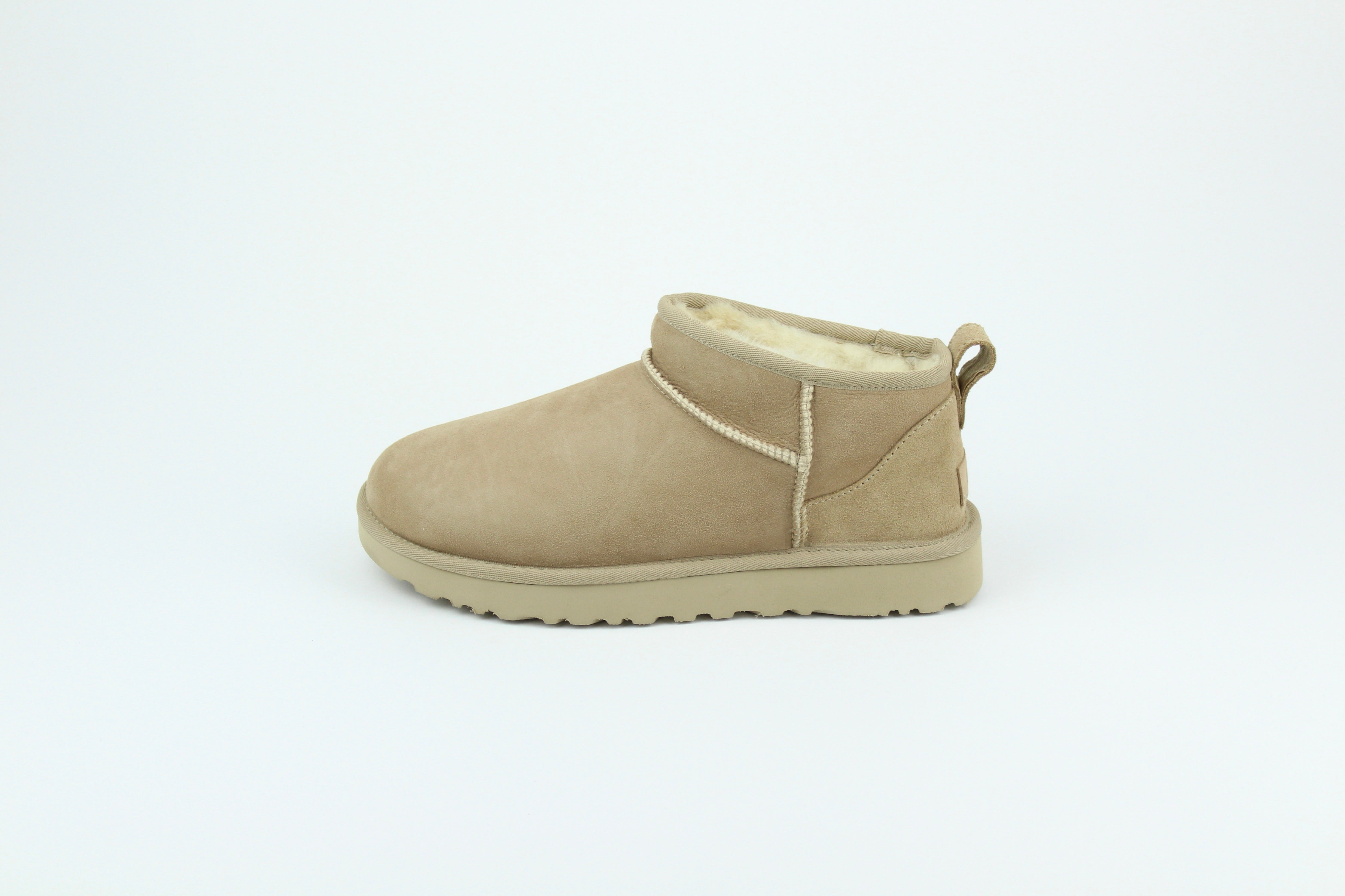 UGG Classic Ultra Mini Sand Women’s – Suede Shearling Ankle Boots, Cozy Winter Footwear, Iconic Comfortable Lifestyle Shoes
