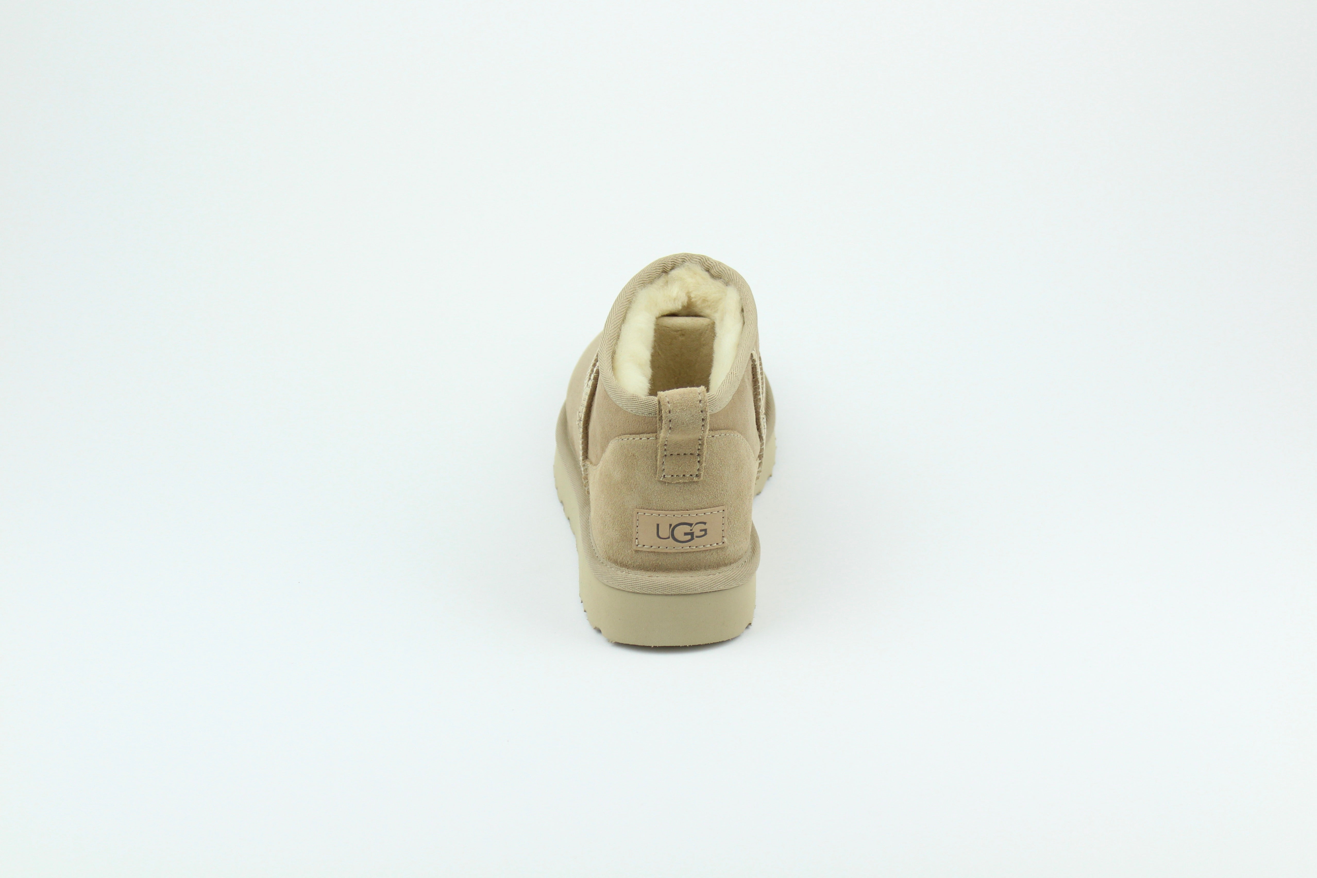 UGG Classic Ultra Mini Sand Women’s – Suede Shearling Ankle Boots, Cozy Winter Footwear, Iconic Comfortable Lifestyle Shoes