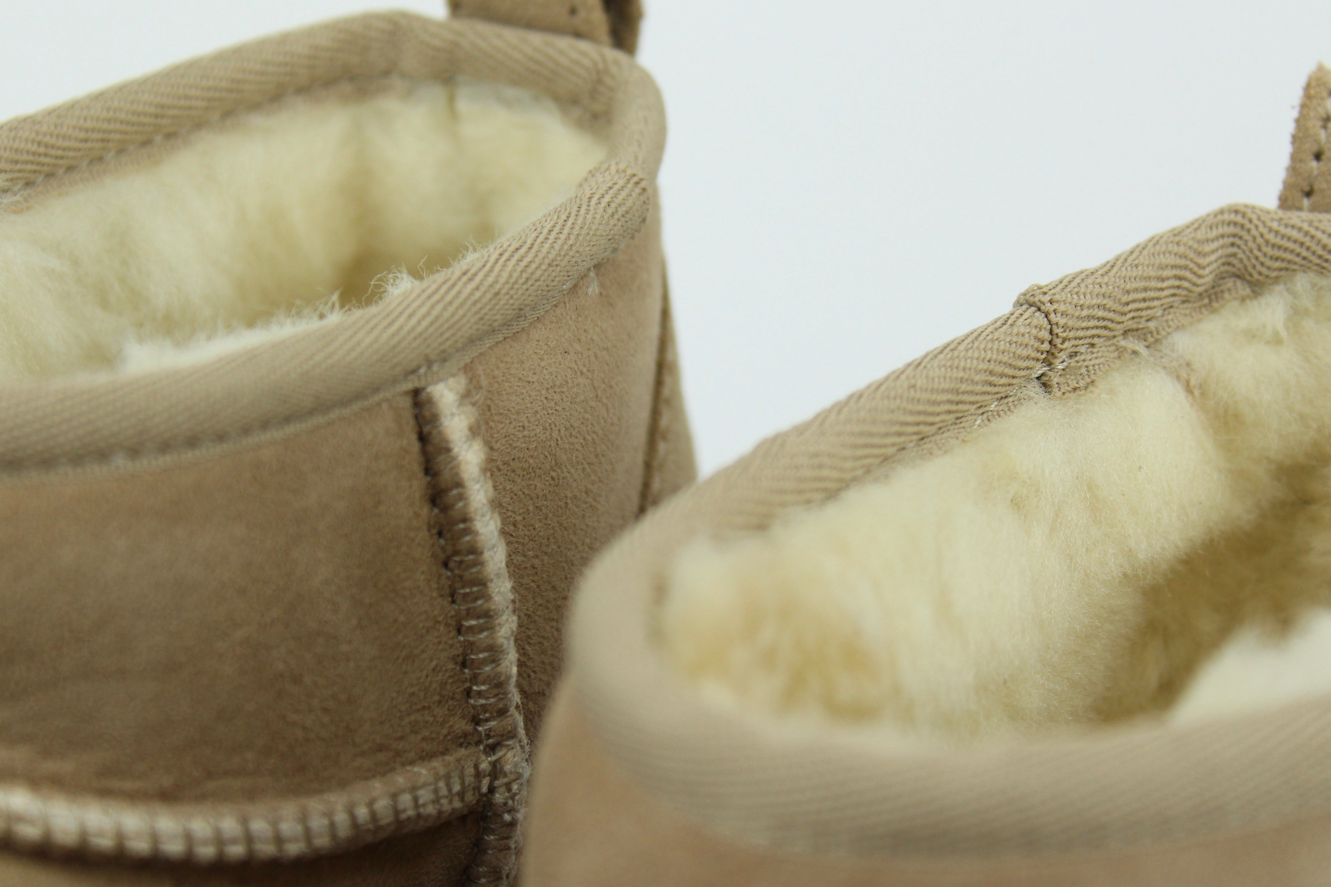 UGG Classic Ultra Mini Sand Women’s – Suede Shearling Ankle Boots, Cozy Winter Footwear, Iconic Comfortable Lifestyle Shoes