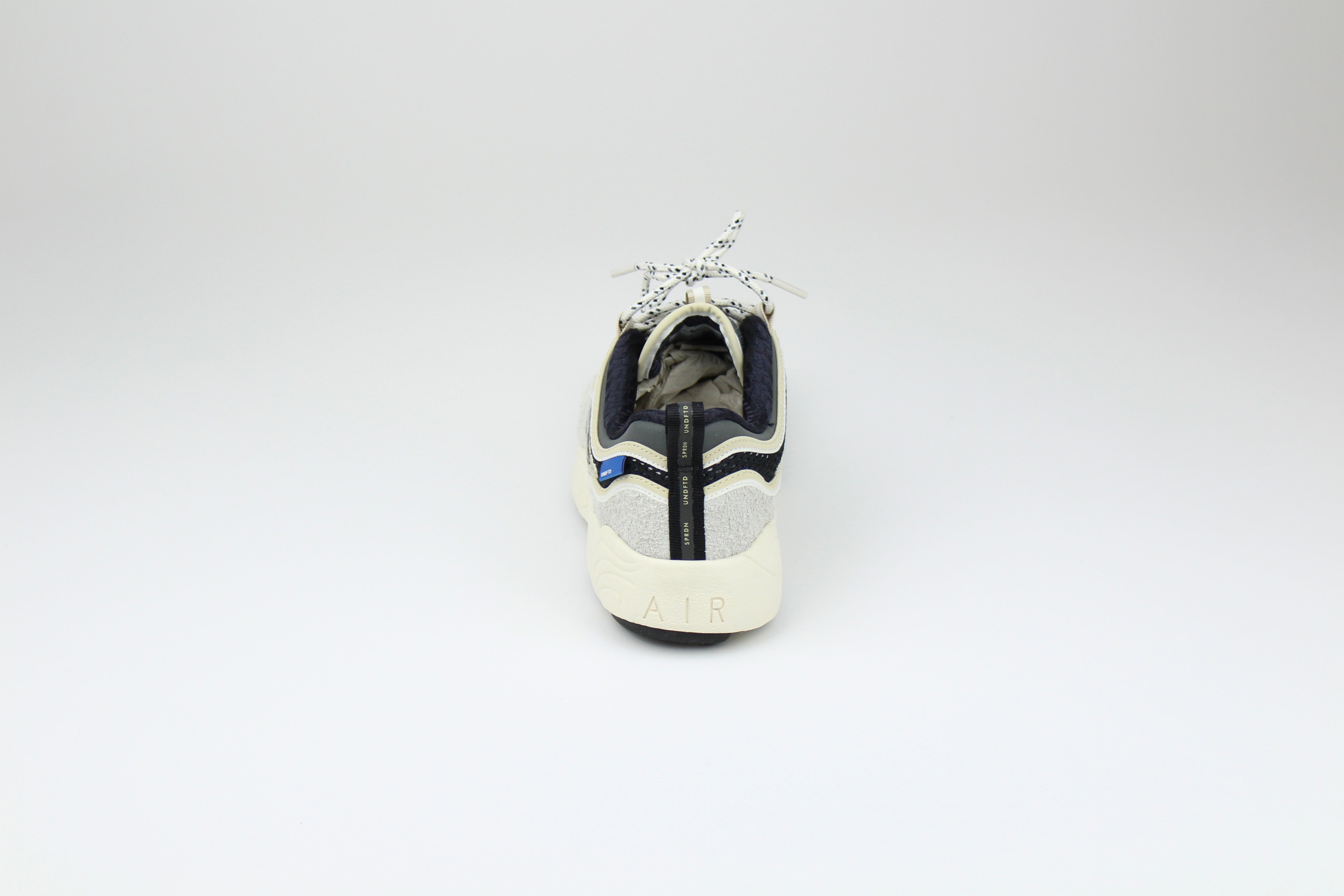 Undefeated x Nike Zoom Spiridon Phantom – Limited Edition Collaboration Sneakers, Cream and Silver Running Shoes, Premium Streetwear Trainers