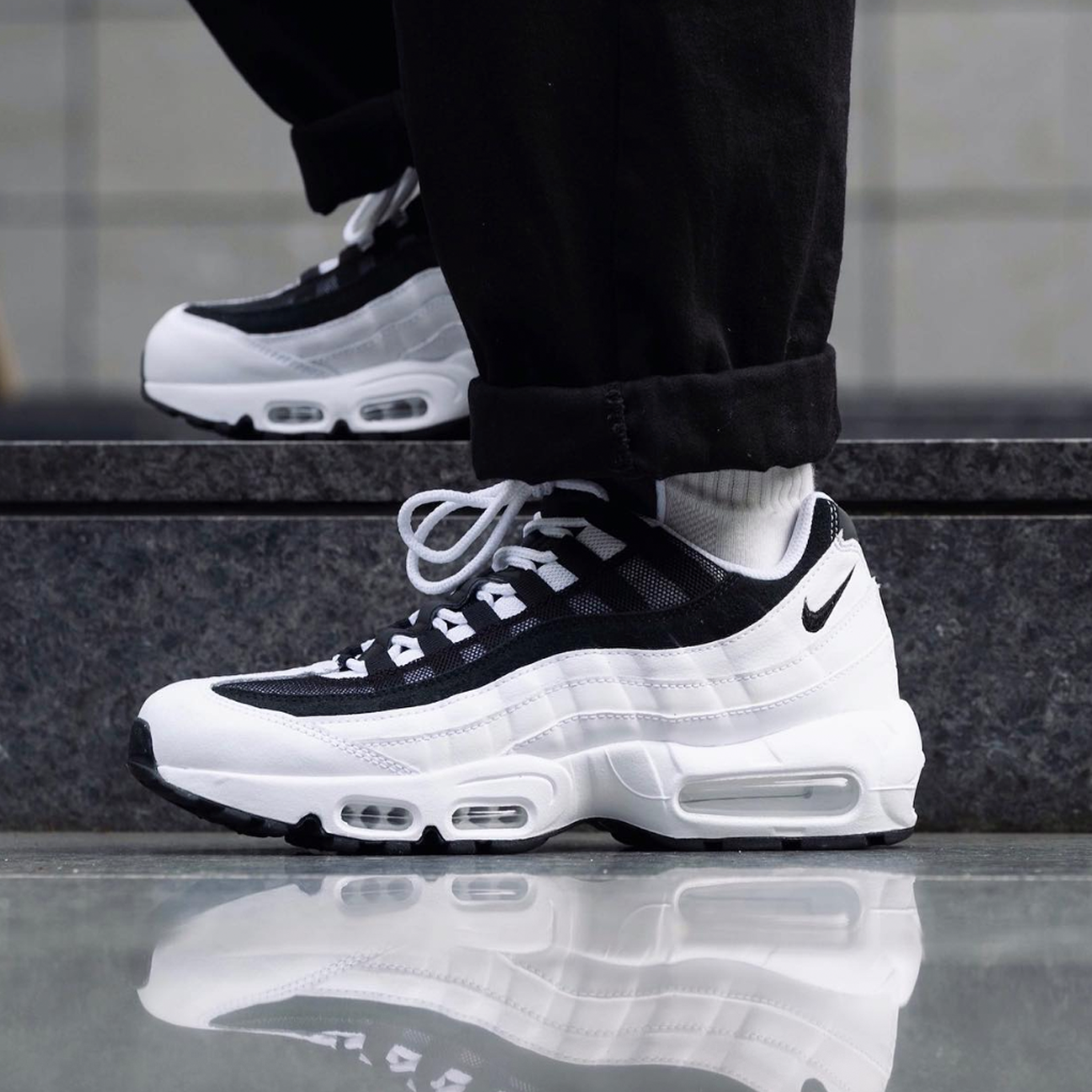 Nike Air Max 95 Yin Yang Black sneaker with layered upper monochrome design and visible Air cushioning available at The Attic
